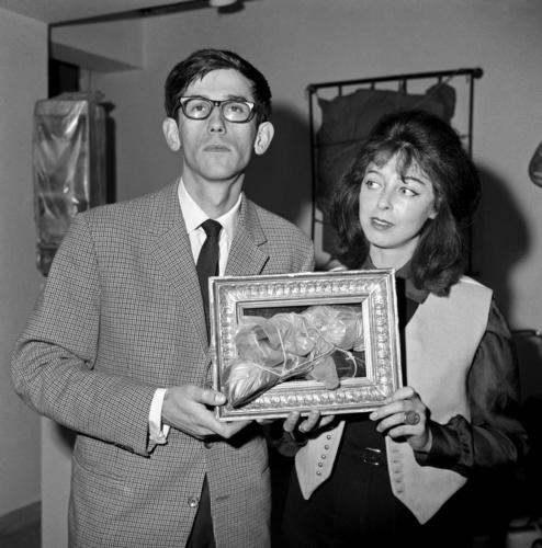 Christo and Jeanne-Claude Holding Artwork